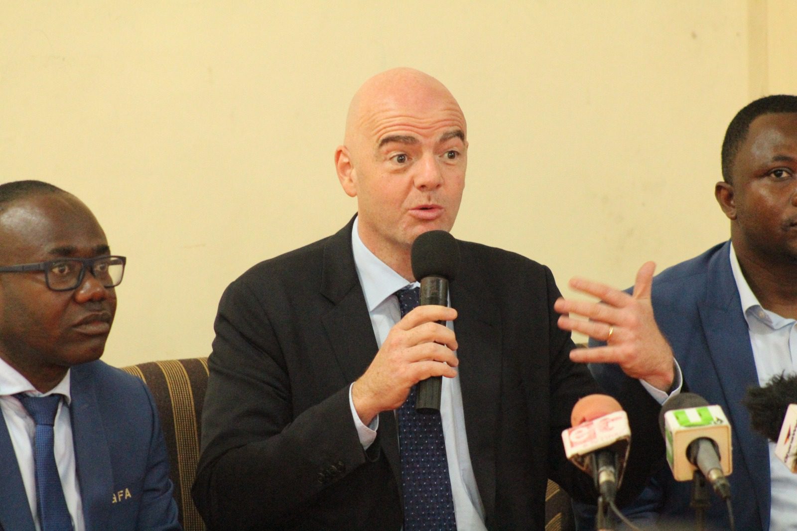 FIFA President, Gianni Infantino [in the middle] speaks to the Press in Accra as GFA President, Kwesi Nyantakyi [left] and Mr. Ibrahim Sannie Darra, GFA Communications Director [right] looks on.