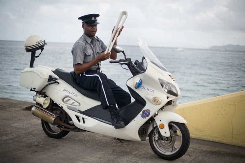 A local police officer with the Baton