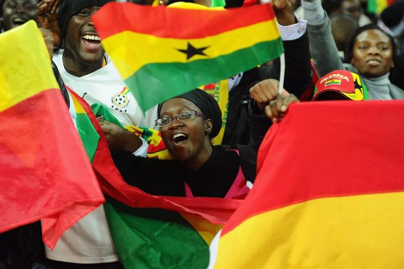 Ghanaian fans celebrating at the Wembley stadium