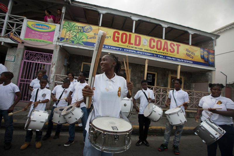 The 1st Nevis Boys Brigade drummers outside the 'Gold Coast' named restaurant 