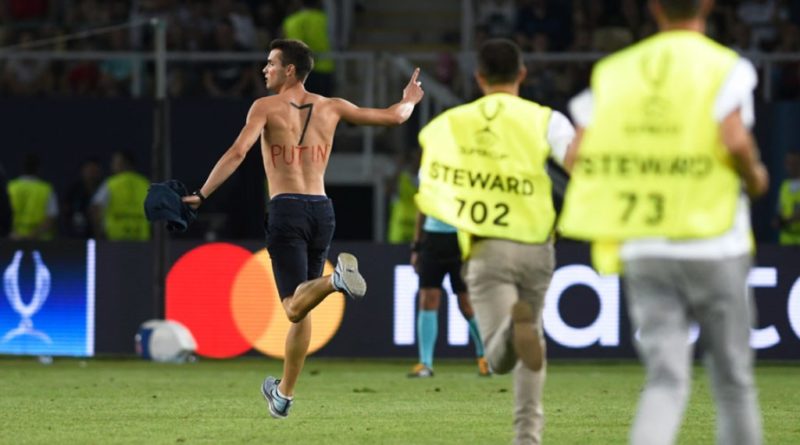 A shirtless man invades pitch at UEFA Super Cup final match