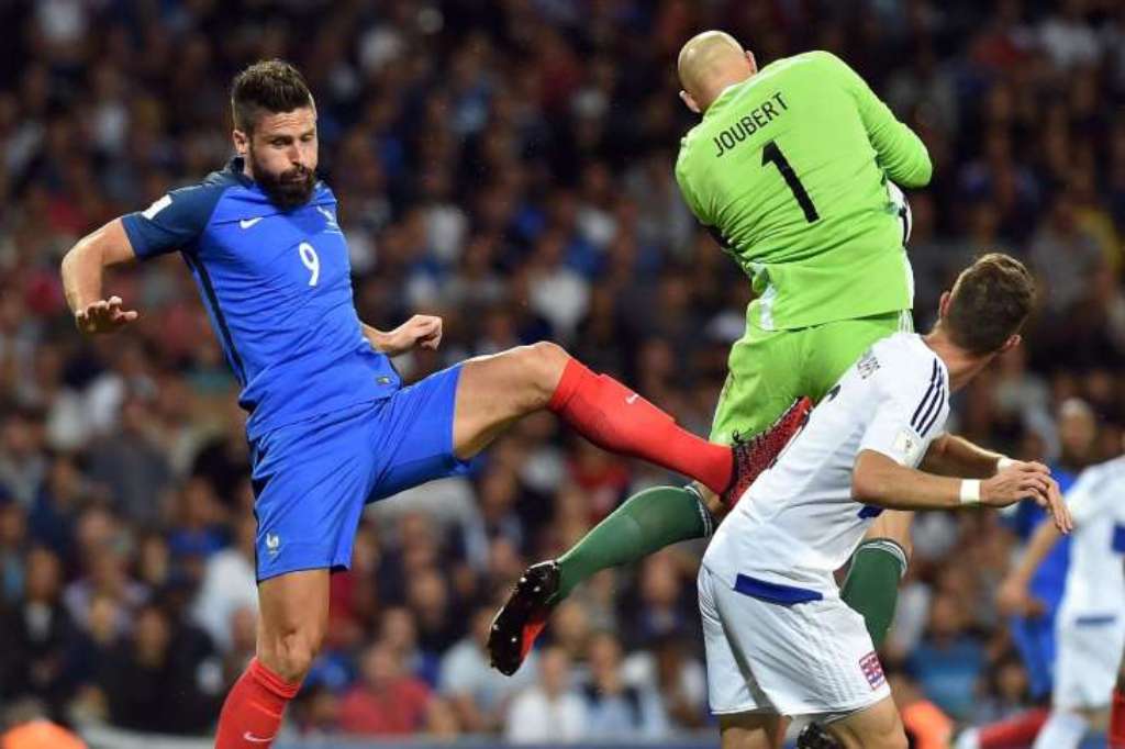 Olivier Giroud misses the air ball as Luxembourg goalie - Joubert grabs