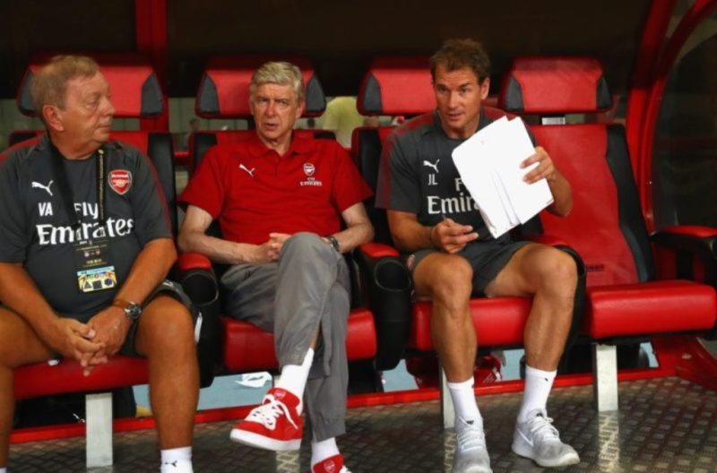 Wenger spotted in the dugout wearing an all Arsenal outfit