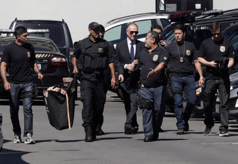 Carlos Nuzman being escorted by the Police