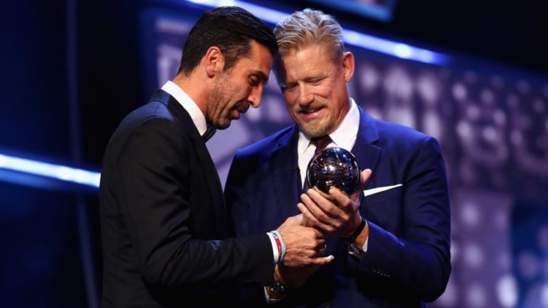 Peter Schmeichel hands over the Best Goalkeeper award to Gianluigi Buffon