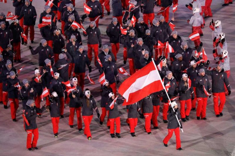 Flag bearer Anna Veith of Austria and teammates enter the stadium during the Opening Ceremony of the PyeongChang 2018 Winter Olympic Games