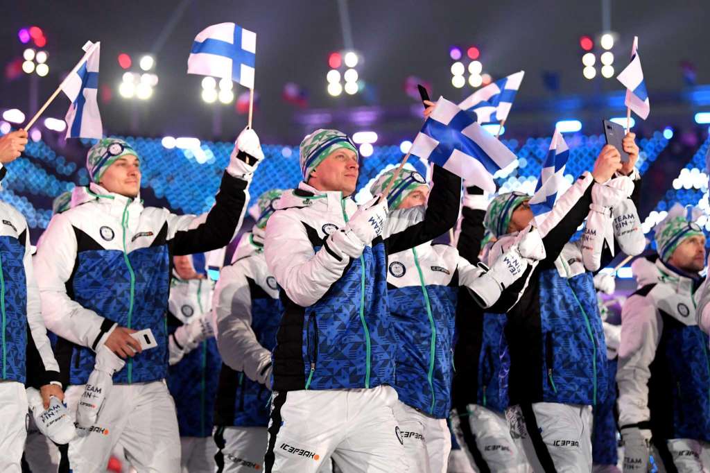 Flag bearer Janne Ahonen of Finland and teammates enter the stadium during the Opening Ceremony of the PyeongChang 2018 Winter Olympic Games