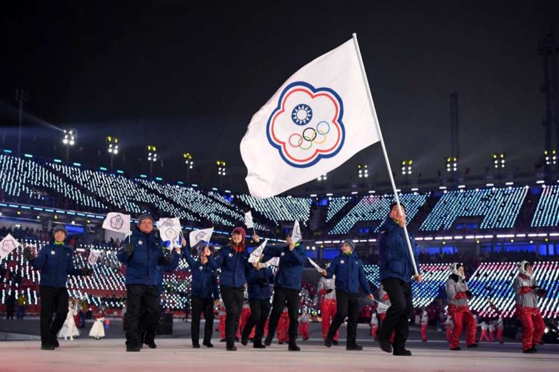 Flag bearer Te-An Lien of Chinese Taipei and teammates enter the stadium during the Opening Ceremony of the PyeongChang 2018 Winter Olympic Games