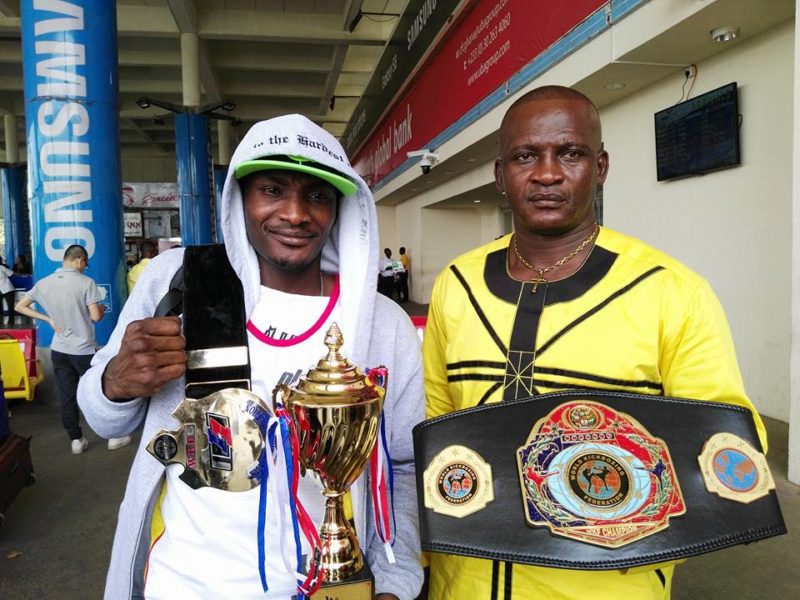 Ghanaian kickboxer Gerald Dah and Nii Dzata I [President of the Ghana Kickboxing Association]