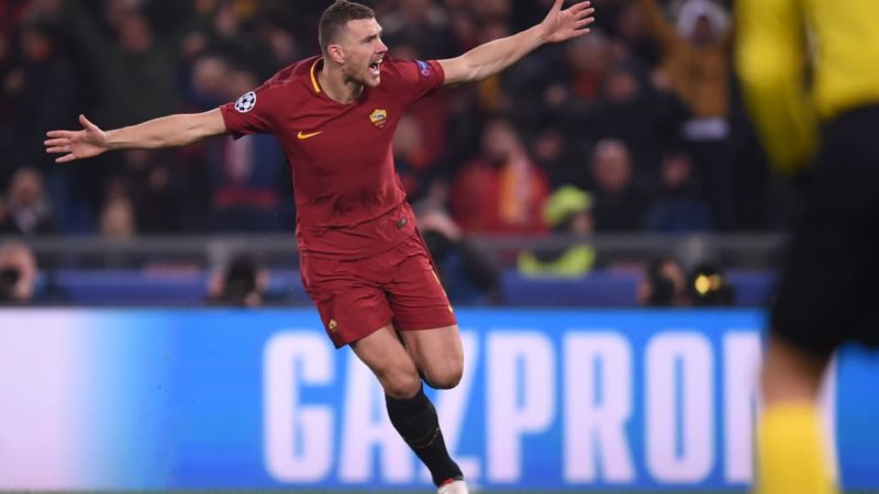 Roma striker Edin Dzeko celebrates after scoring