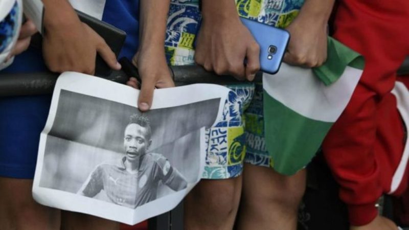 A Nigerian supporters holding a picture of Ahmed Musa