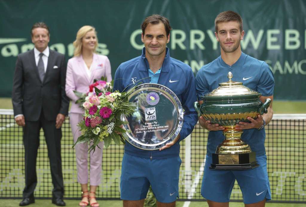 Coric and Federer takes a photo shot