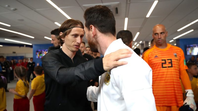 Modric [left] sharing pleasantries with Mess