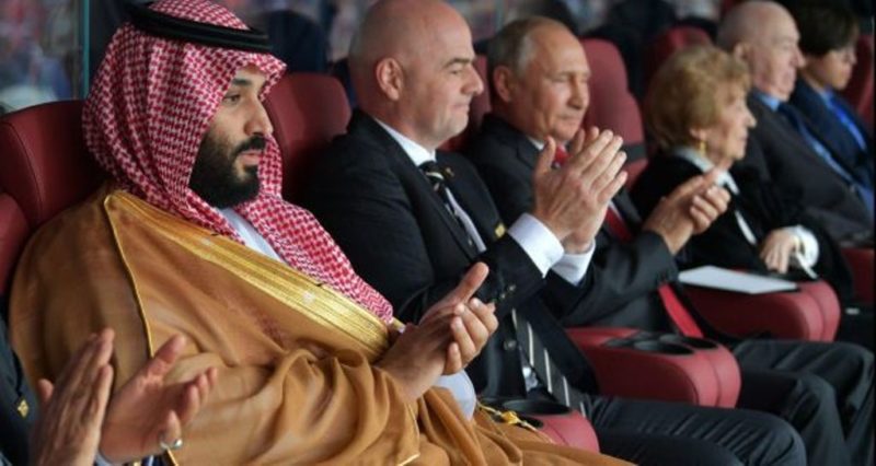 Mohammad bin Salman, Fifa president Gianni Infantino and Russian president Vladimir Putin at the World Cup 2018
