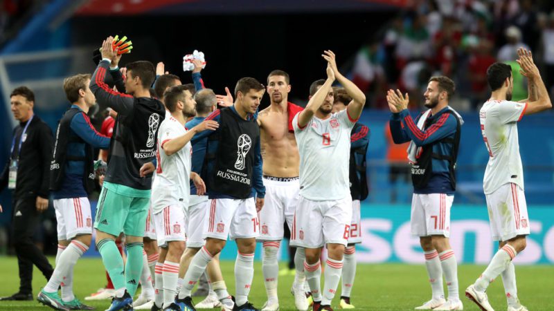 Spanish players congratulating their supporters after their win over Iran