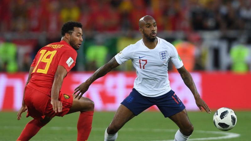 Fabian Delph of England is challenged by Moussa Dembele of Belgium