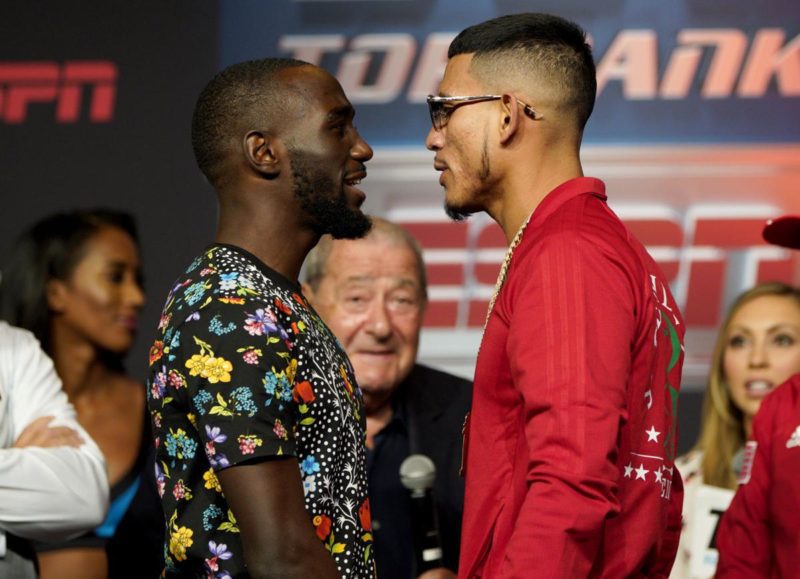 Crawford [left] faces off with Benavidez