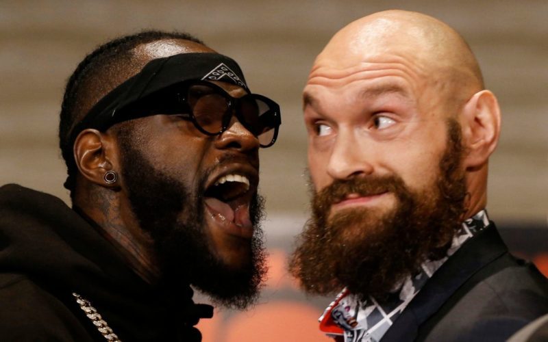 Deonty Wilder [left] faces off with Tyson Fury