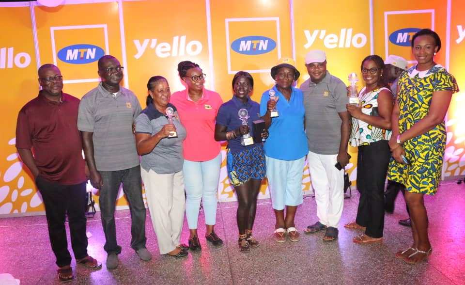 Winners of the just ended MTN Invitational Golf Tournament displaying their trophies