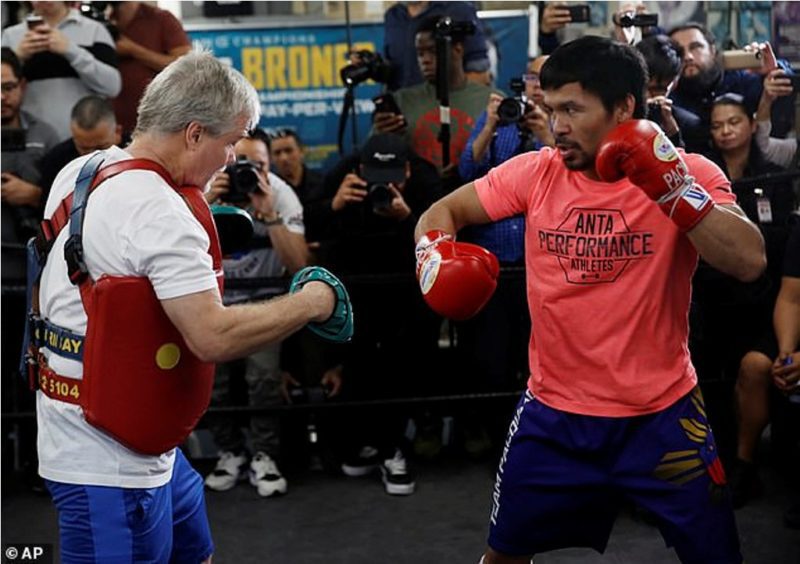 The Filipino is put through a session on the pads by long time trainer Freddie Roach