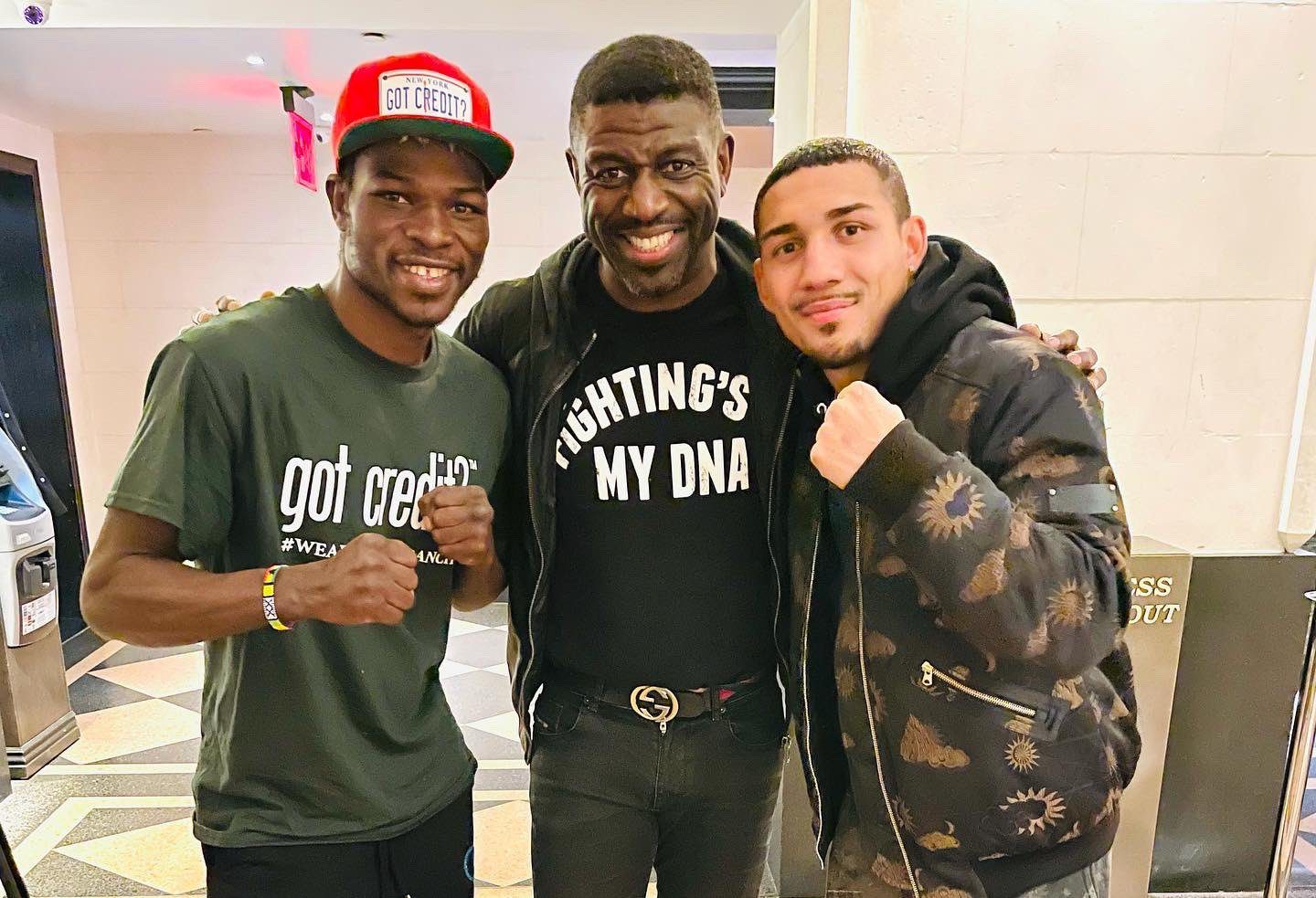 Michael Amoo Bediako [middle] in a pose with Richard Commey and Teofimo Lopez